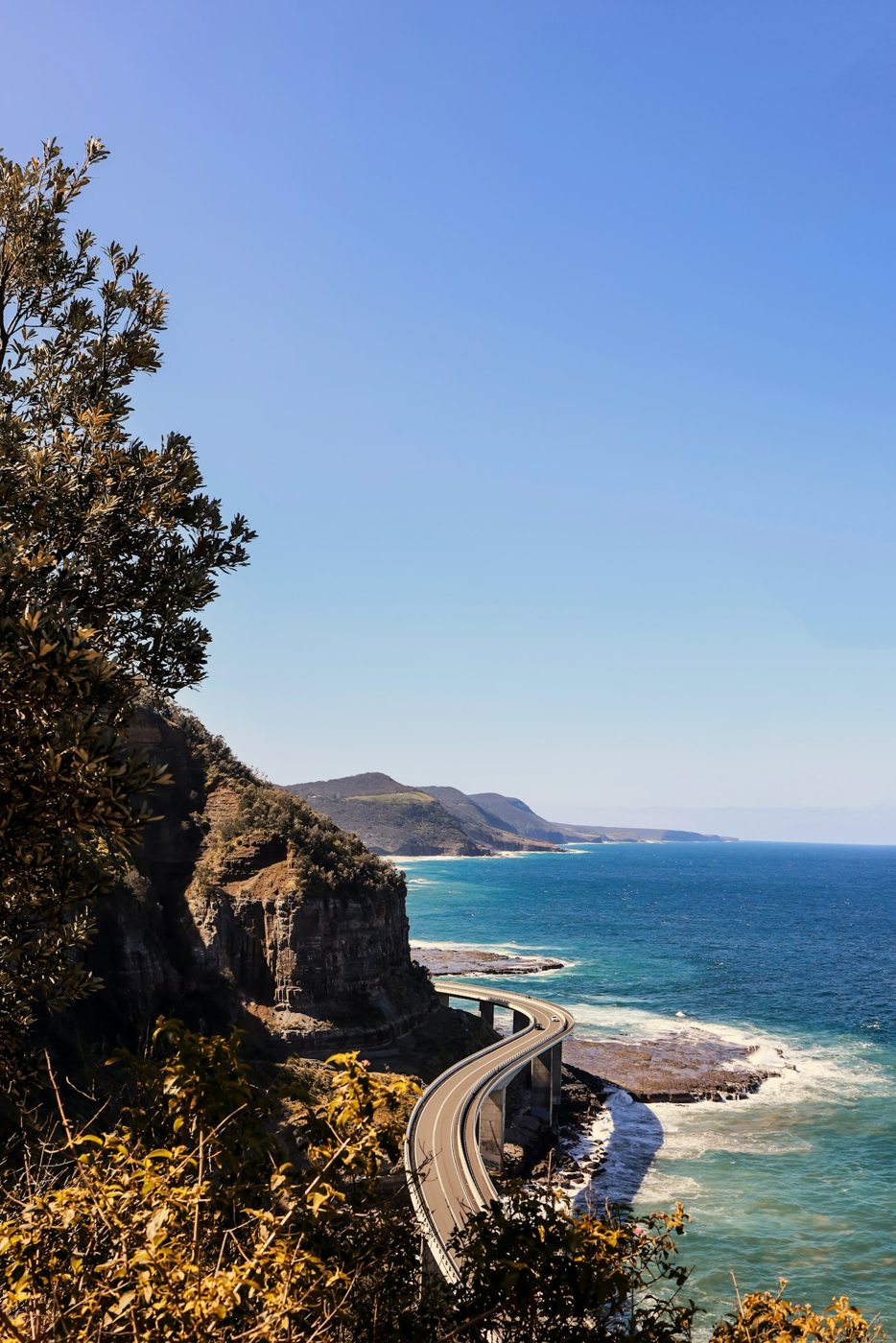 Sea Cliff Bridge winding between the escarpment and ocean