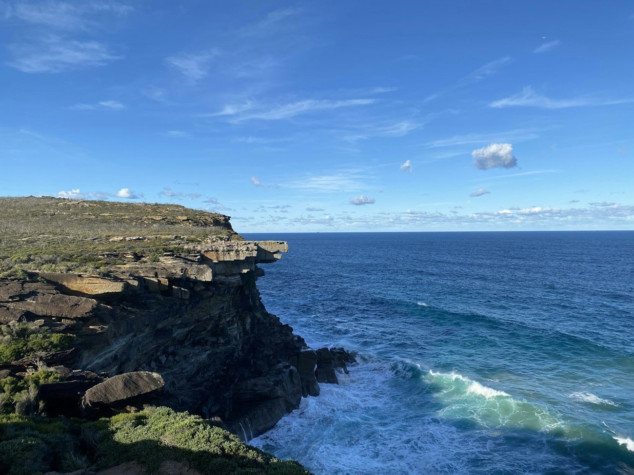 Sandstone cliffs overlooking the ocean in Royal National Park