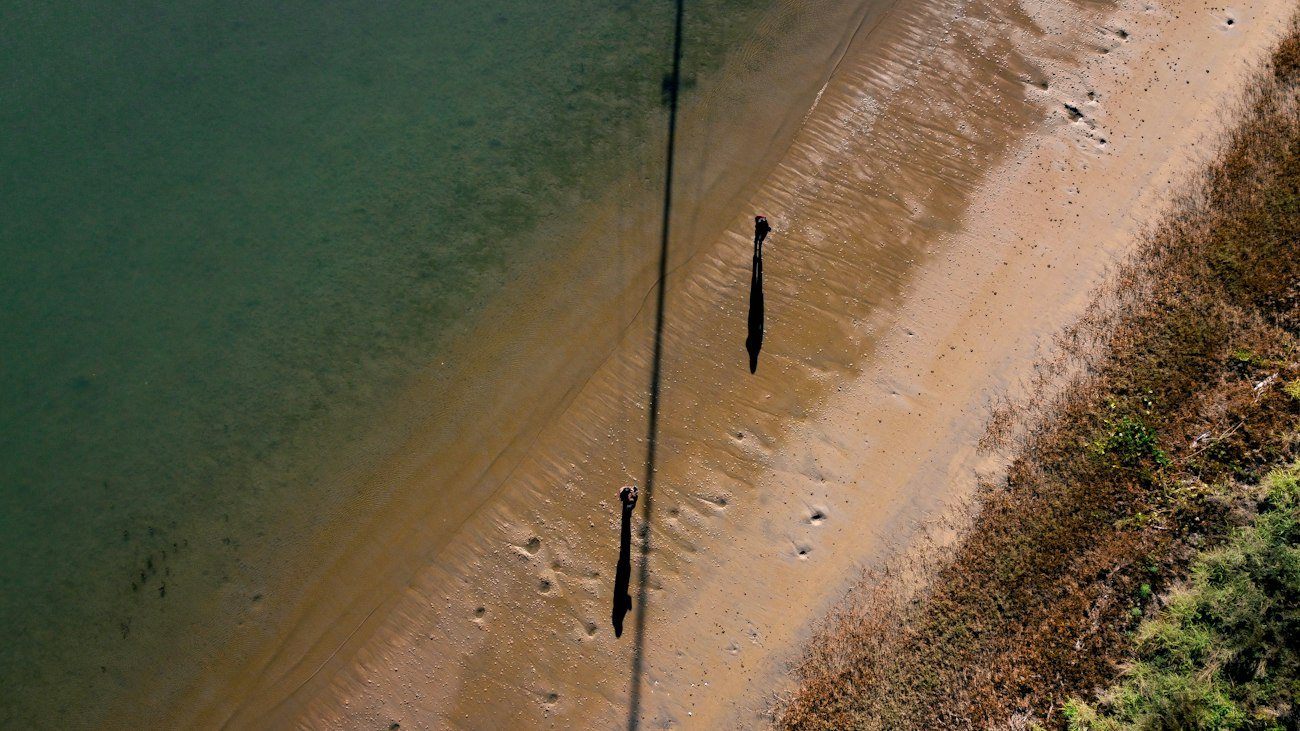 A shallow sandy shoreline near Bundaberg from above