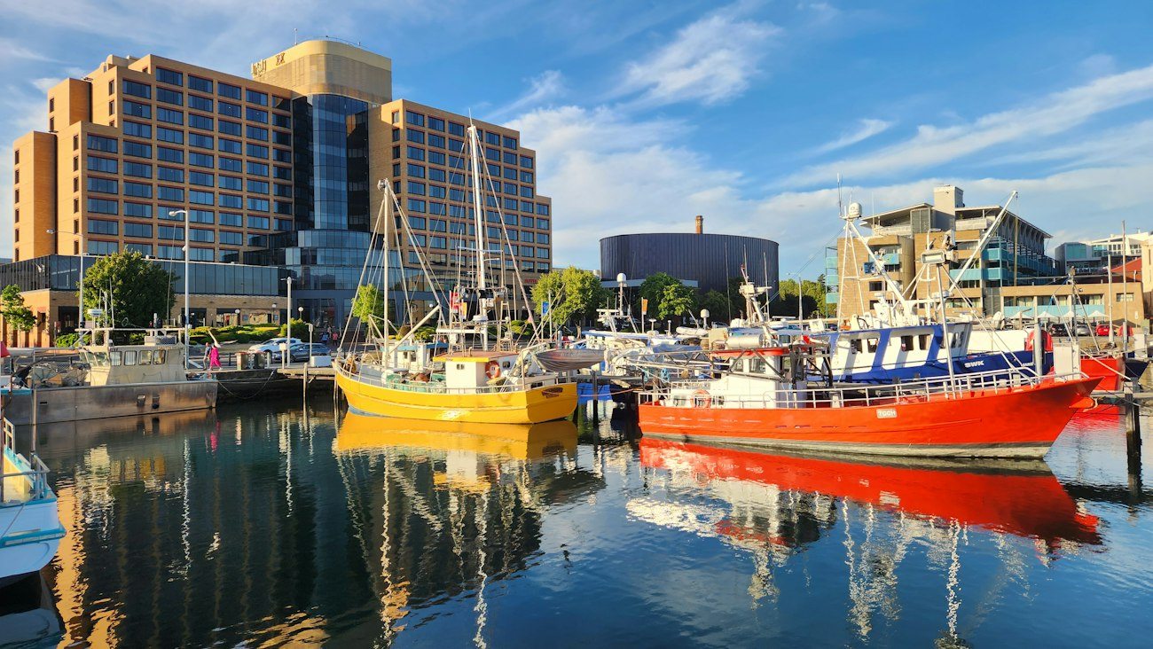 Fishing boats reflected in Hobart's harbour