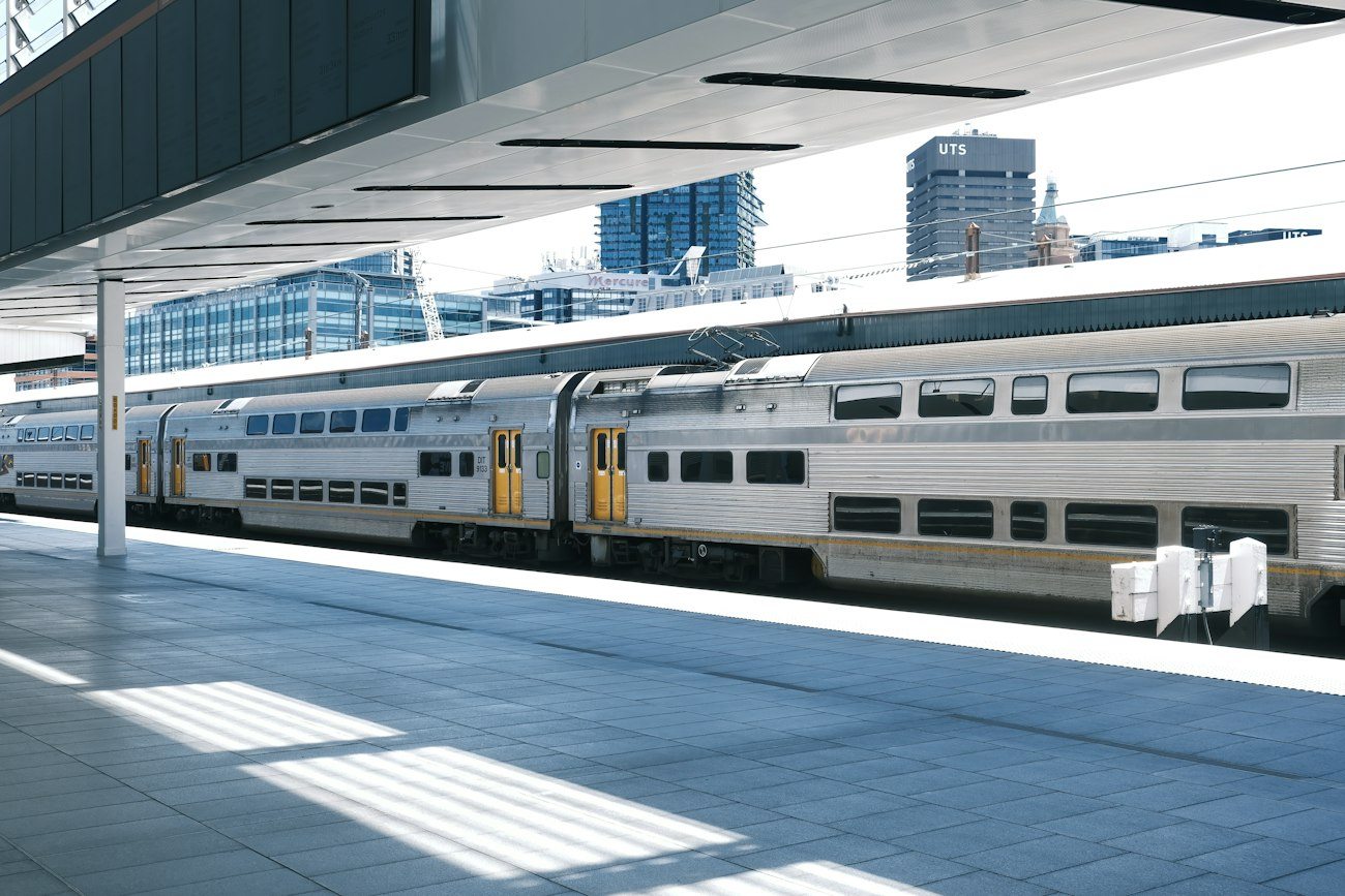 A double-decker passenger train at a Sydney platform