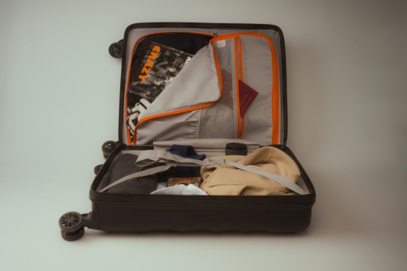 Clothing packed inside an open suitcase